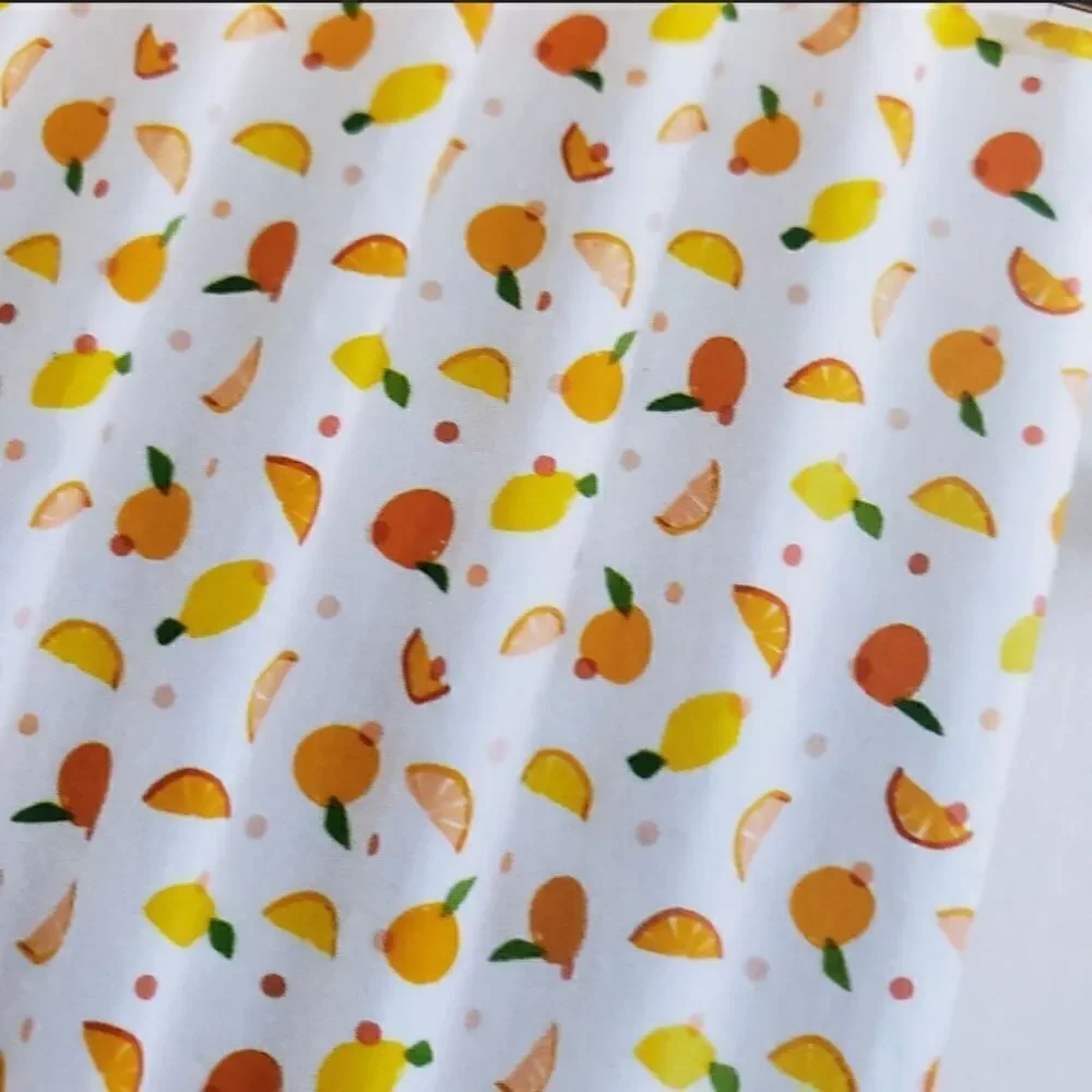 The Kate Spade Citrus Dot Shower Curtains